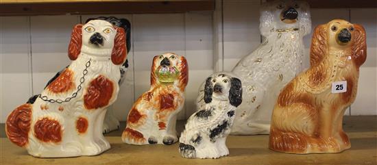 Seven Staffordshire pottery spaniels